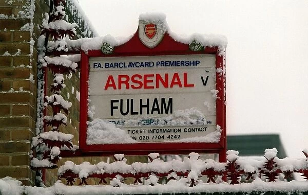 Winter's Embrace: Arsenal Stadium in a Snow-Kissed Highbury