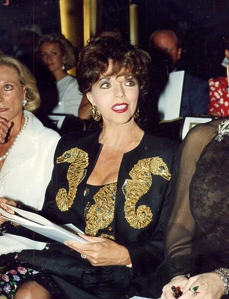 Joan Collins at Valentino fashion show wearing jewelled suit 27  /  07  /  1989