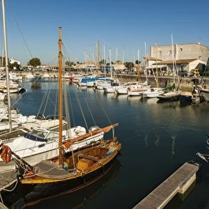 Yachts moored at the Quai de Bernonville in this north coast town, Saint Martin de Re