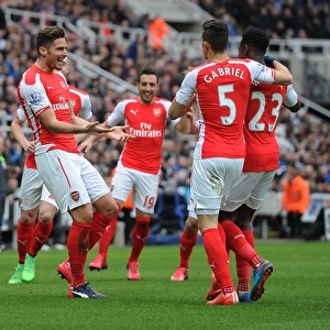 Giroud, Gabriel, and Welbeck Celebrate Arsenal's Victory over Newcastle United in the Premier League (2014/15)